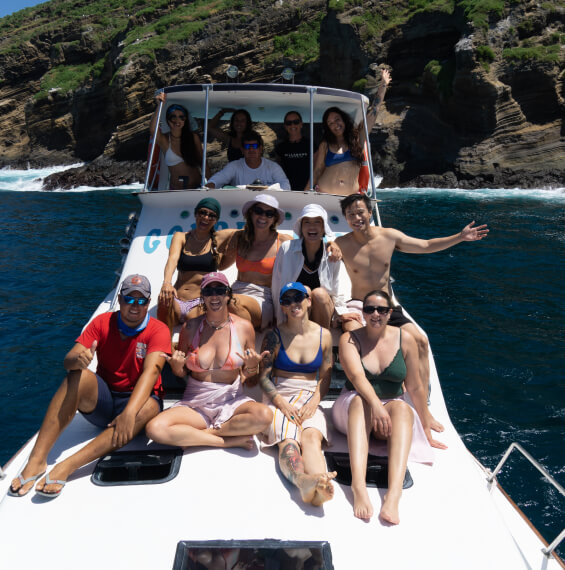Group of travelers enjoying a boat ride during a Galapagos freediving adventure